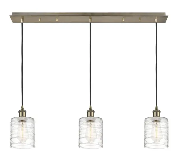 The organic teardrop shape of the Crown Point pendant is artfully hung from a tiered metal frame that is complemented by a single filament bulb. These pendants look great as individual fixtures but make a grand statement when paired with our multi-port hanging system as part of our custom cord program.