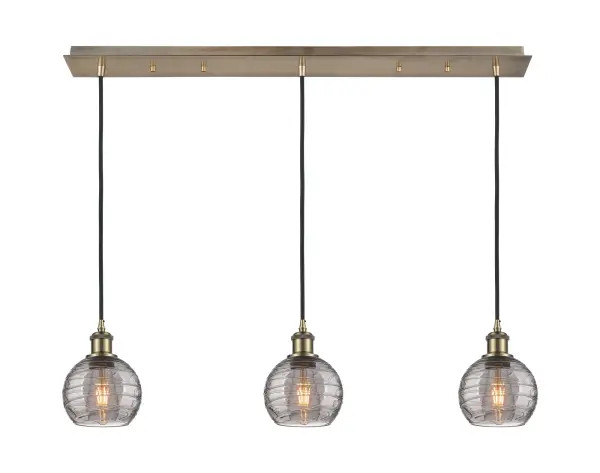 The organic teardrop shape of the Crown Point pendant is artfully hung from a tiered metal frame that is complemented by a single filament bulb. These pendants look great as individual fixtures but make a grand statement when paired with our multi-port hanging system as part of our custom cord program.