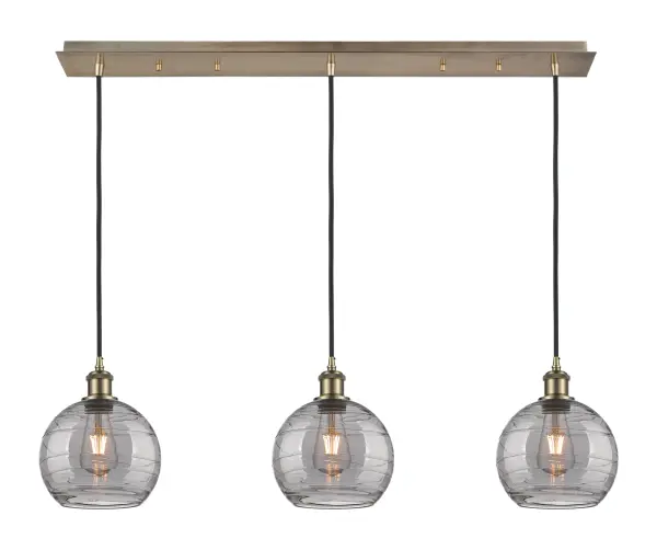 The organic teardrop shape of the Crown Point pendant is artfully hung from a tiered metal frame that is complemented by a single filament bulb. These pendants look great as individual fixtures but make a grand statement when paired with our multi-port hanging system as part of our custom cord program.