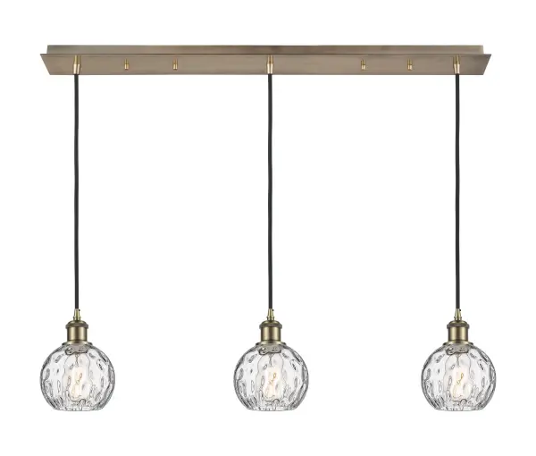 The organic teardrop shape of the Crown Point pendant is artfully hung from a tiered metal frame that is complemented by a single filament bulb. These pendants look great as individual fixtures but make a grand statement when paired with our multi-port hanging system as part of our custom cord program.