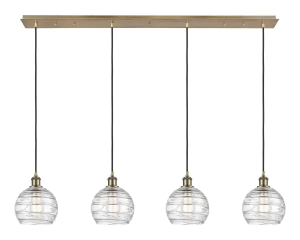 The organic teardrop shape of the Crown Point pendant is artfully hung from a tiered metal frame that is complemented by a single filament bulb. These pendants look great as individual fixtures but make a grand statement when paired with our multi-port hanging system as part of our custom cord program.