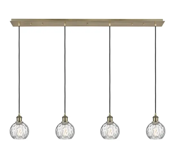 The organic teardrop shape of the Crown Point pendant is artfully hung from a tiered metal frame that is complemented by a single filament bulb. These pendants look great as individual fixtures but make a grand statement when paired with our multi-port hanging system as part of our custom cord program.