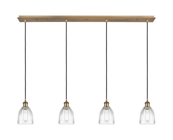 The organic teardrop shape of the Crown Point pendant is artfully hung from a tiered metal frame that is complemented by a single filament bulb. These pendants look great as individual fixtures but make a grand statement when paired with our multi-port hanging system as part of our custom cord program.