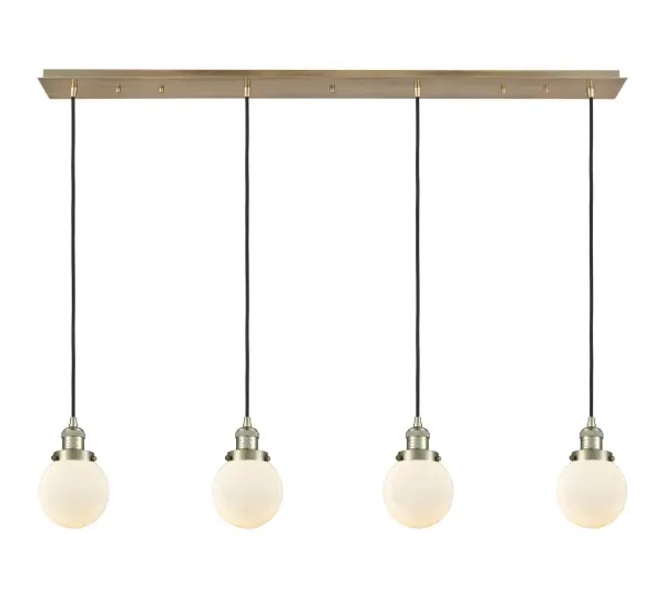 The organic teardrop shape of the Crown Point pendant is artfully hung from a tiered metal frame that is complemented by a single filament bulb. These pendants look great as individual fixtures but make a grand statement when paired with our multi-port hanging system as part of our custom cord program.