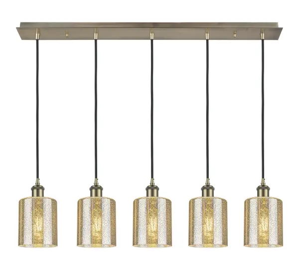 The organic teardrop shape of the Crown Point pendant is artfully hung from a tiered metal frame that is complemented by a single filament bulb. These pendants look great as individual fixtures but make a grand statement when paired with our multi-port hanging system as part of our custom cord program.