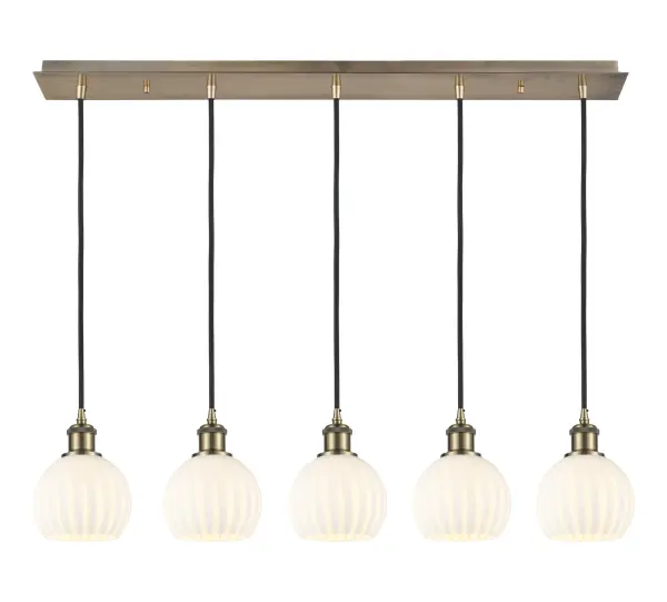 The organic teardrop shape of the Crown Point pendant is artfully hung from a tiered metal frame that is complemented by a single filament bulb. These pendants look great as individual fixtures but make a grand statement when paired with our multi-port hanging system as part of our custom cord program.