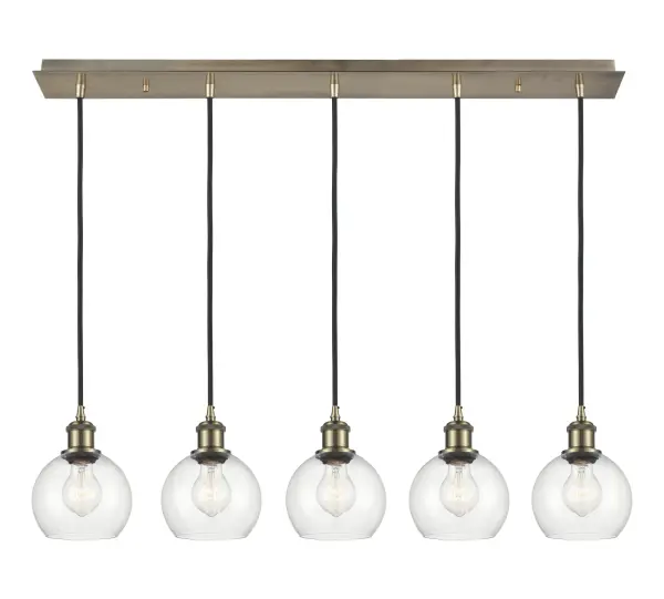 The organic teardrop shape of the Crown Point pendant is artfully hung from a tiered metal frame that is complemented by a single filament bulb. These pendants look great as individual fixtures but make a grand statement when paired with our multi-port hanging system as part of our custom cord program.