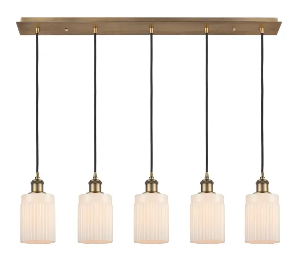 The organic teardrop shape of the Crown Point pendant is artfully hung from a tiered metal frame that is complemented by a single filament bulb. These pendants look great as individual fixtures but make a grand statement when paired with our multi-port hanging system as part of our custom cord program.