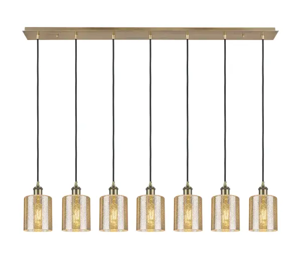 The organic teardrop shape of the Crown Point pendant is artfully hung from a tiered metal frame that is complemented by a single filament bulb. These pendants look great as individual fixtures but make a grand statement when paired with our multi-port hanging system as part of our custom cord program.