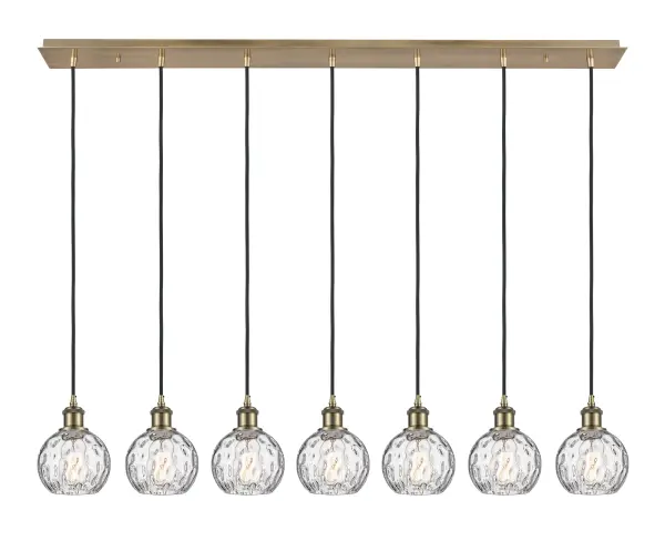 The organic teardrop shape of the Crown Point pendant is artfully hung from a tiered metal frame that is complemented by a single filament bulb. These pendants look great as individual fixtures but make a grand statement when paired with our multi-port hanging system as part of our custom cord program.