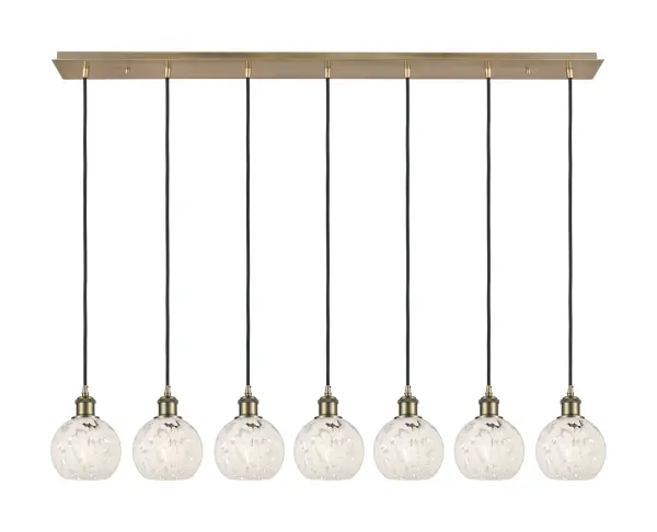 The organic teardrop shape of the Crown Point pendant is artfully hung from a tiered metal frame that is complemented by a single filament bulb. These pendants look great as individual fixtures but make a grand statement when paired with our multi-port hanging system as part of our custom cord program.
