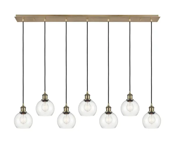 The organic teardrop shape of the Crown Point pendant is artfully hung from a tiered metal frame that is complemented by a single filament bulb. These pendants look great as individual fixtures but make a grand statement when paired with our multi-port hanging system as part of our custom cord program. - alternate view