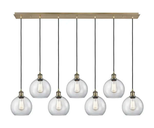 The organic teardrop shape of the Crown Point pendant is artfully hung from a tiered metal frame that is complemented by a single filament bulb. These pendants look great as individual fixtures but make a grand statement when paired with our multi-port hanging system as part of our custom cord program.