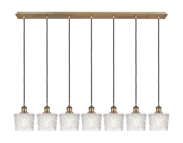 The organic teardrop shape of the Crown Point pendant is artfully hung from a tiered metal frame that is complemented by a single filament bulb. These pendants look great as individual fixtures but make a grand statement when paired with our multi-port hanging system as part of our custom cord program.