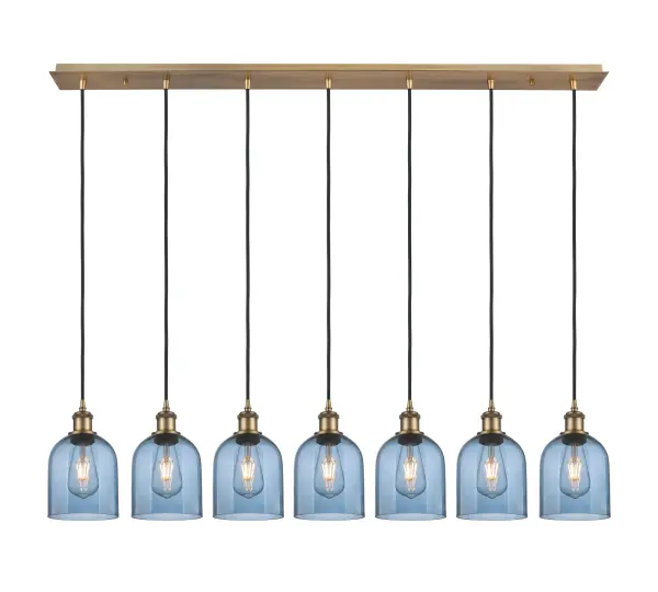 The organic teardrop shape of the Crown Point pendant is artfully hung from a tiered metal frame that is complemented by a single filament bulb. These pendants look great as individual fixtures but make a grand statement when paired with our multi-port hanging system as part of our custom cord program.