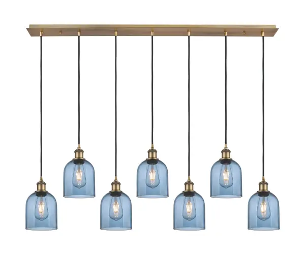 The organic teardrop shape of the Crown Point pendant is artfully hung from a tiered metal frame that is complemented by a single filament bulb. These pendants look great as individual fixtures but make a grand statement when paired with our multi-port hanging system as part of our custom cord program. - alternate view