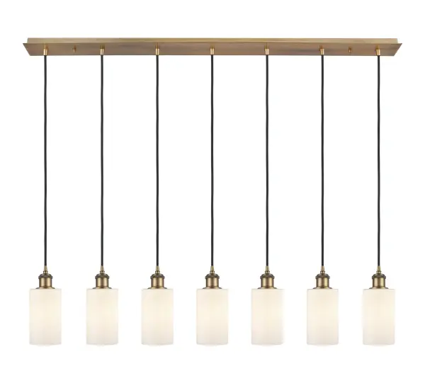 The organic teardrop shape of the Crown Point pendant is artfully hung from a tiered metal frame that is complemented by a single filament bulb. These pendants look great as individual fixtures but make a grand statement when paired with our multi-port hanging system as part of our custom cord program.