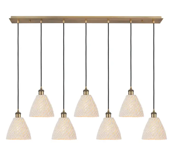The organic teardrop shape of the Crown Point pendant is artfully hung from a tiered metal frame that is complemented by a single filament bulb. These pendants look great as individual fixtures but make a grand statement when paired with our multi-port hanging system as part of our custom cord program.