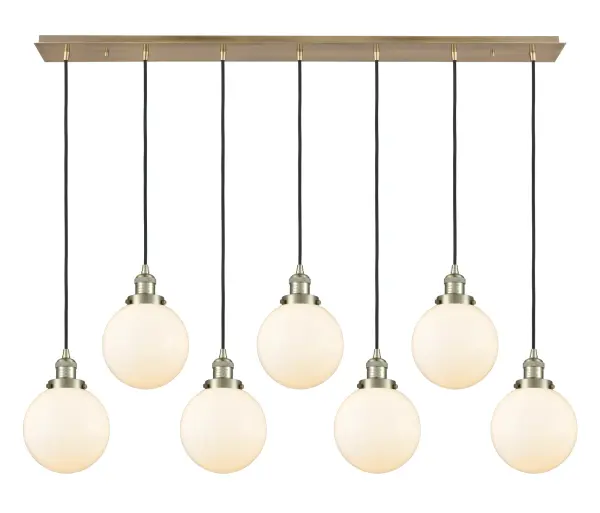 The organic teardrop shape of the Crown Point pendant is artfully hung from a tiered metal frame that is complemented by a single filament bulb. These pendants look great as individual fixtures but make a grand statement when paired with our multi-port hanging system as part of our custom cord program.