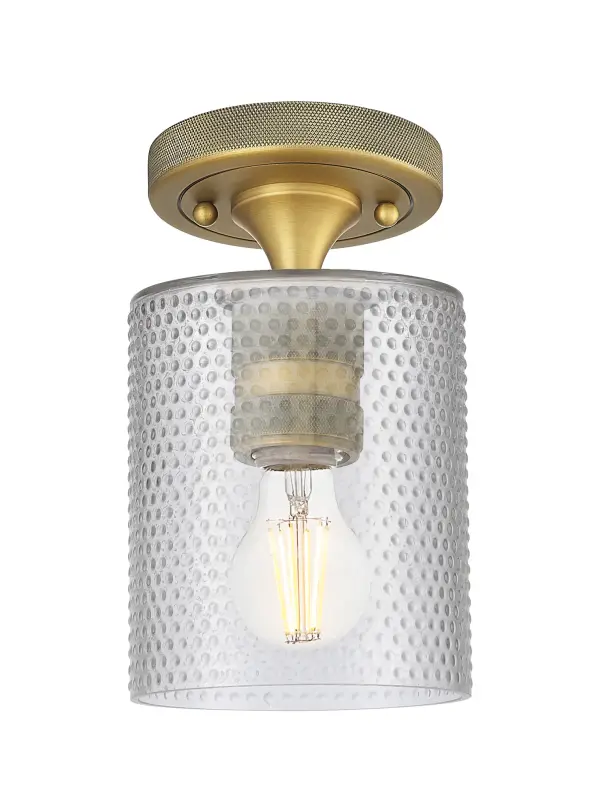 Details abound in the Crown Point Collection with an industrial take on modern sophistication. This stunning line of fixtures features cylindrical glass set in an updated restoration style frame with intricate knurling detail on the sockets, canopy, and finials.