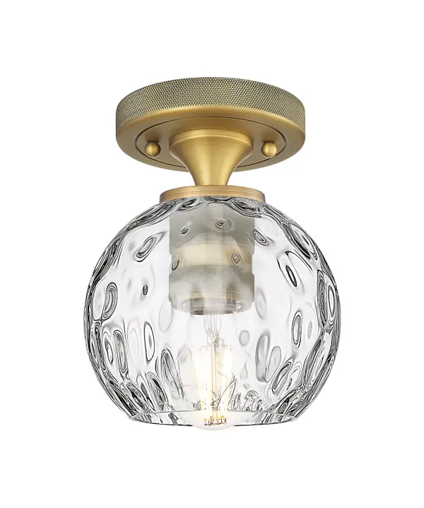 Details abound in the Crown Point Collection with an industrial take on modern sophistication. This stunning line of fixtures features cylindrical glass set in an updated restoration style frame with intricate knurling detail on the sockets, canopy, and finials.