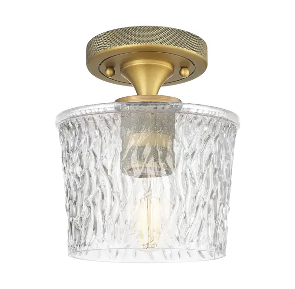 Details abound in the Crown Point Collection with an industrial take on modern sophistication. This stunning line of fixtures features cylindrical glass set in an updated restoration style frame with intricate knurling detail on the sockets, canopy, and finials.