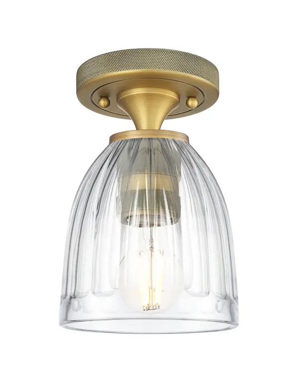 Details abound in the Crown Point Collection with an industrial take on modern sophistication. This stunning line of fixtures features cylindrical glass set in an updated restoration style frame with intricate knurling detail on the sockets, canopy, and finials.