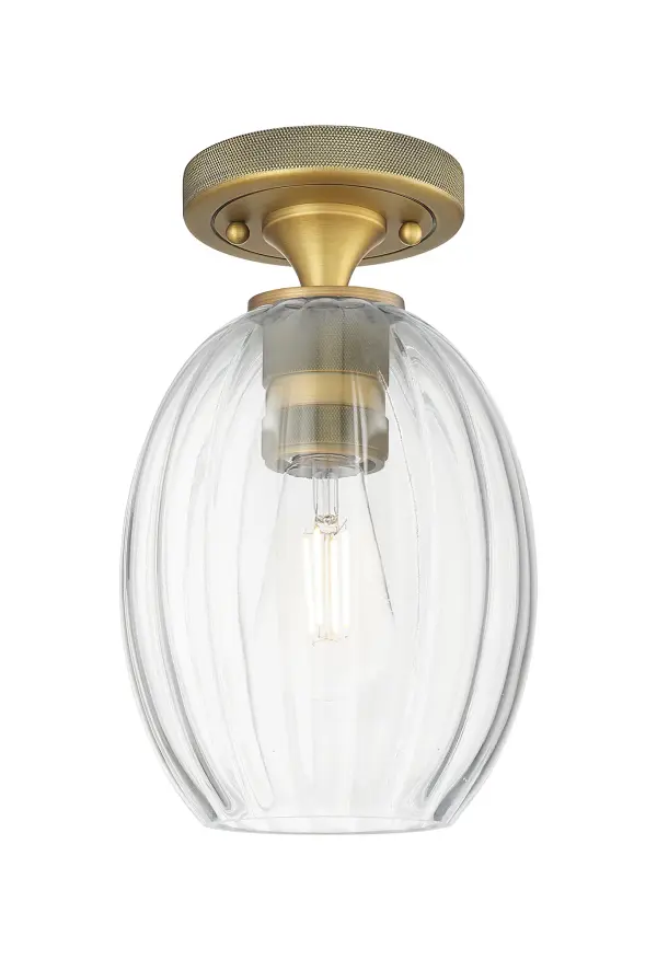 Details abound in the Crown Point Collection with an industrial take on modern sophistication. This stunning line of fixtures features cylindrical glass set in an updated restoration style frame with intricate knurling detail on the sockets, canopy, and finials.