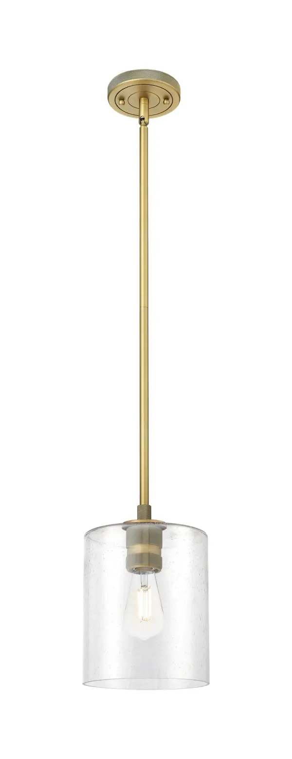 Details abound in the Crown Point Collection with an industrial take on modern sophistication. This stunning line of fixtures features cylindrical glass set in an updated restoration style frame with intricate knurling detail on the sockets, canopy, and finials.