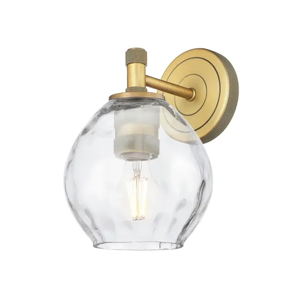 Details abound in the Crown Point Collection with an industrial take on modern sophistication. This stunning line of fixtures features cylindrical glass set in an updated restoration style frame with intricate knurling detail on the sockets, canopy, and finials.