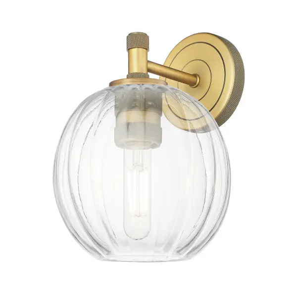 Details abound in the Crown Point Collection with an industrial take on modern sophistication. This stunning line of fixtures features cylindrical glass set in an updated restoration style frame with intricate knurling detail on the sockets, canopy, and finials.