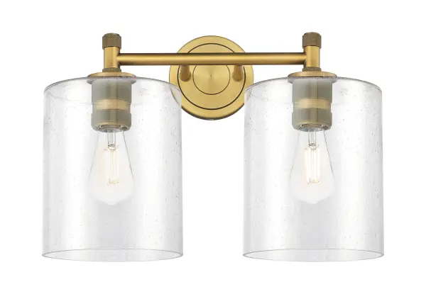 Details abound in the Crown Point Collection with an industrial take on modern sophistication. This stunning line of fixtures features cylindrical glass set in an updated restoration style frame with intricate knurling detail on the sockets, canopy, and finials. - alternate view