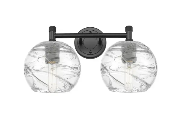 Details abound in the Crown Point Collection with an industrial take on modern sophistication. This stunning line of fixtures features cylindrical glass set in an updated restoration style frame with intricate knurling detail on the sockets, canopy, and finials.