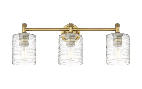 Details abound in the Crown Point Collection with an industrial take on modern sophistication. This stunning line of fixtures features cylindrical glass set in an updated restoration style frame with intricate knurling detail on the sockets, canopy, and finials.