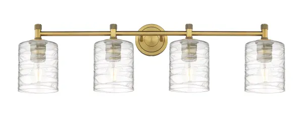 Details abound in the Crown Point Collection with an industrial take on modern sophistication. This stunning line of fixtures features cylindrical glass set in an updated restoration style frame with intricate knurling detail on the sockets, canopy, and finials.