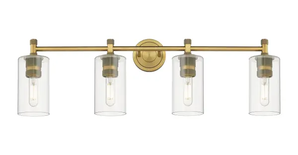 Details abound in the Crown Point Collection with an industrial take on modern sophistication. This stunning line of fixtures features cylindrical glass set in an updated restoration style frame with intricate knurling detail on the sockets, canopy, and finials.
