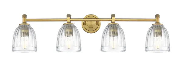 Details abound in the Crown Point Collection with an industrial take on modern sophistication. This stunning line of fixtures features cylindrical glass set in an updated restoration style frame with intricate knurling detail on the sockets, canopy, and finials.