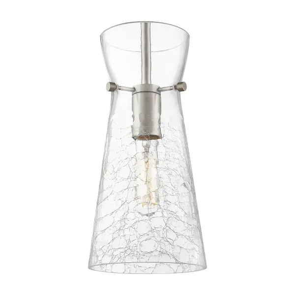The Nicole is a modern industrial collection that incorporates exceptional architectural details and an equally striking cone shaped shade. The geometric shape of the glass or metal shade give this collection a charming and timeless presence. For a kitchen light choice that stands out, look no further than the Nicole pendant.