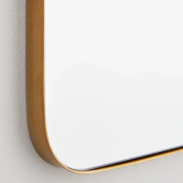 The Stadium mirror combines practical functionality with contemporary style. Its rounded rectangle contour and 1-inch extension create visual interest, while the gold finish adds warmth to any space. - alternate view