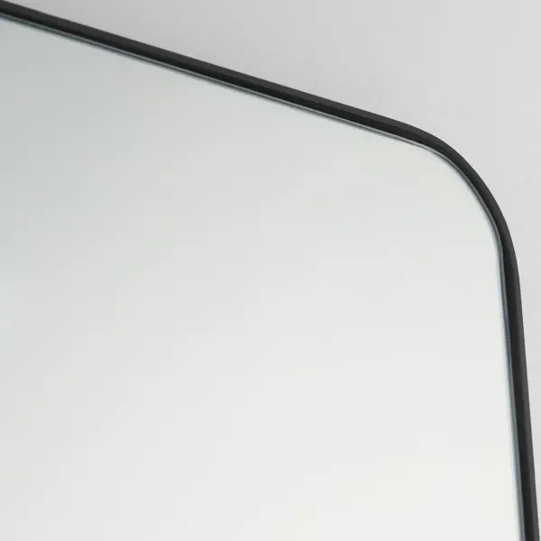 The Stadium mirror combines contemporary styling with practical functionality. Its rounded rectangle shape and 1-inch frame extension create visual interest while the matte black finish adds sophistication to any space. - alternate view