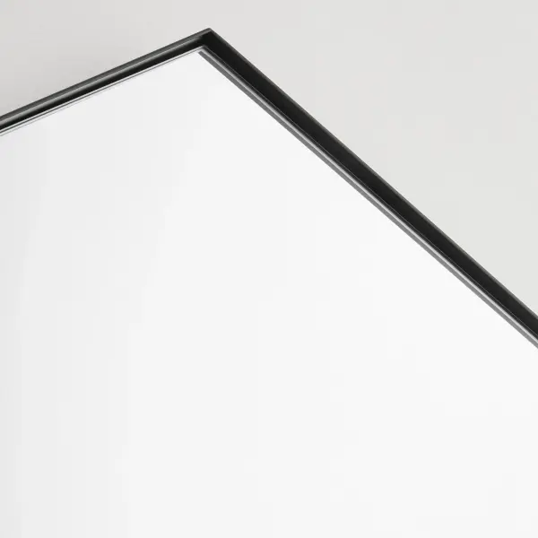 This hexagonal mirror combines modern geometric design with practical functionality. The 1-inch frame extension in matte black finish adds depth and visual interest while remaining versatile enough for residential and commercial spaces. - alternate view