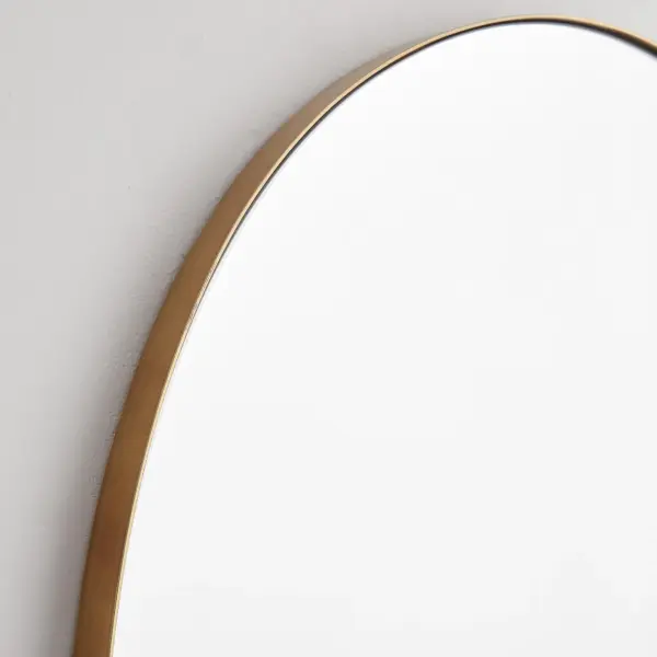 This 29"x46" arched mirror combines timeless design with modern versatility. The matte gold finish and 1-inch frame extension add depth and elegance, making it suitable for residential and commercial spaces alike. - alternate view