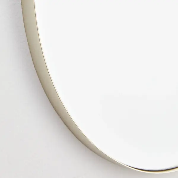 The Capsule mirror features a distinctive pill-shaped contour with a 1-inch extension and matte silver finish. Its 21"x40" size makes it ideal for full-length viewing while the clean, contemporary design fits seamlessly into modern interiors. - alternate view