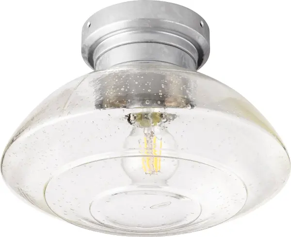 The Windmill Light Kit combines weathered industrial design with modern sensibility. Clear seeded glass creates a soft, nostalgic shimmer while the galvanized finish adds rustic authenticity to transitional spaces.