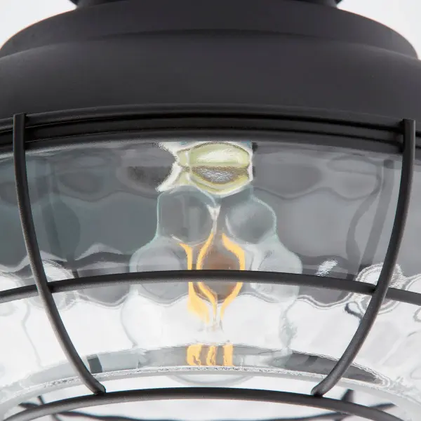 The Windmill Small Hudson combines barn-inspired hardware with hammered glass for authentic industrial style. Damp-rated for porches and patios, its protective cage design adds character while the black finish complements farmhouse and coastal interiors. - alternate view
