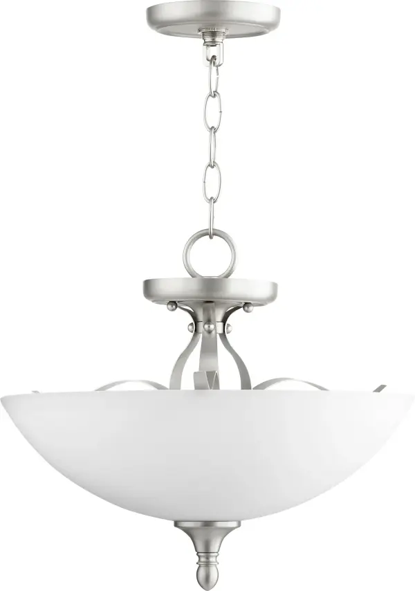 The Jardin semi-flush mount combines intricate finials and soft curves with a clean glass shade, creating an understated elegance. Its satin nickel finish and transitional design make it adaptable to various spaces.