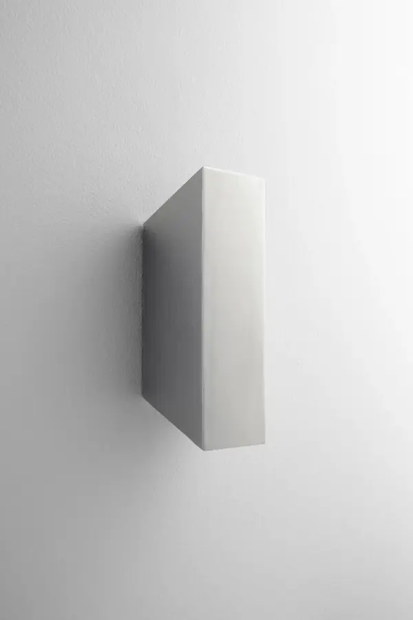 The Duo LED Wall Sconce delivers efficient, modern lighting in a sleek satin nickel finish. Its compact 3-inch profile and frosted glass shades make it ideal for bathrooms and hallways where space is limited.
