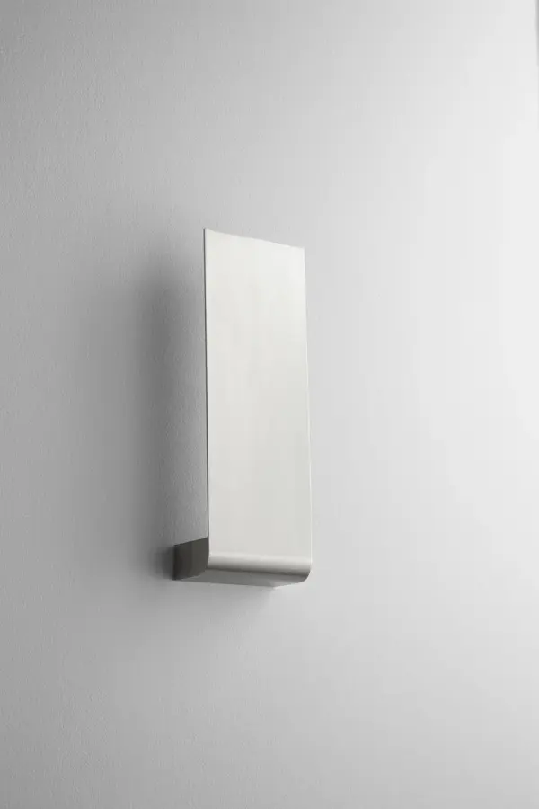 The Halo LED sconce delivers 1475 lumens of warm 3000K light through a matte white diffuser, creating soft, even illumination. Its compact 5.5-inch width and integrated LED make it ideal for modern bathrooms and hallways.