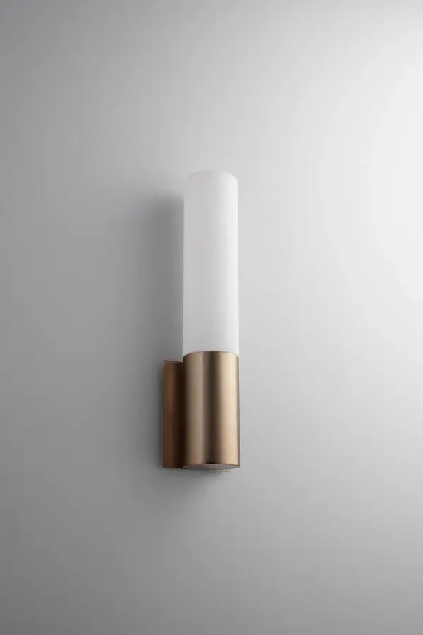 The Magnum LED Wall Sconce combines contemporary styling with practical LED technology. Its satin copper finish and matte white shade create a sophisticated look while delivering 1475 lumens of warm 3000K light.