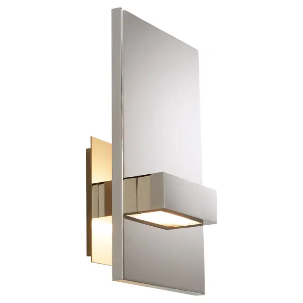 The Vela LED sconce combines contemporary styling with integrated LED technology. Its compact 6.88" width and polished nickel finish make it ideal for modern bathrooms and hallways where clean lines and efficient lighting are priorities. - alternate view